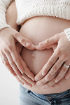Hände Herz Babybauch